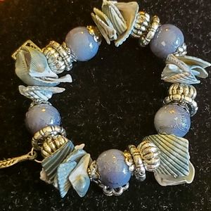 Blue, silvertone beaded sea shell stretch bracelet